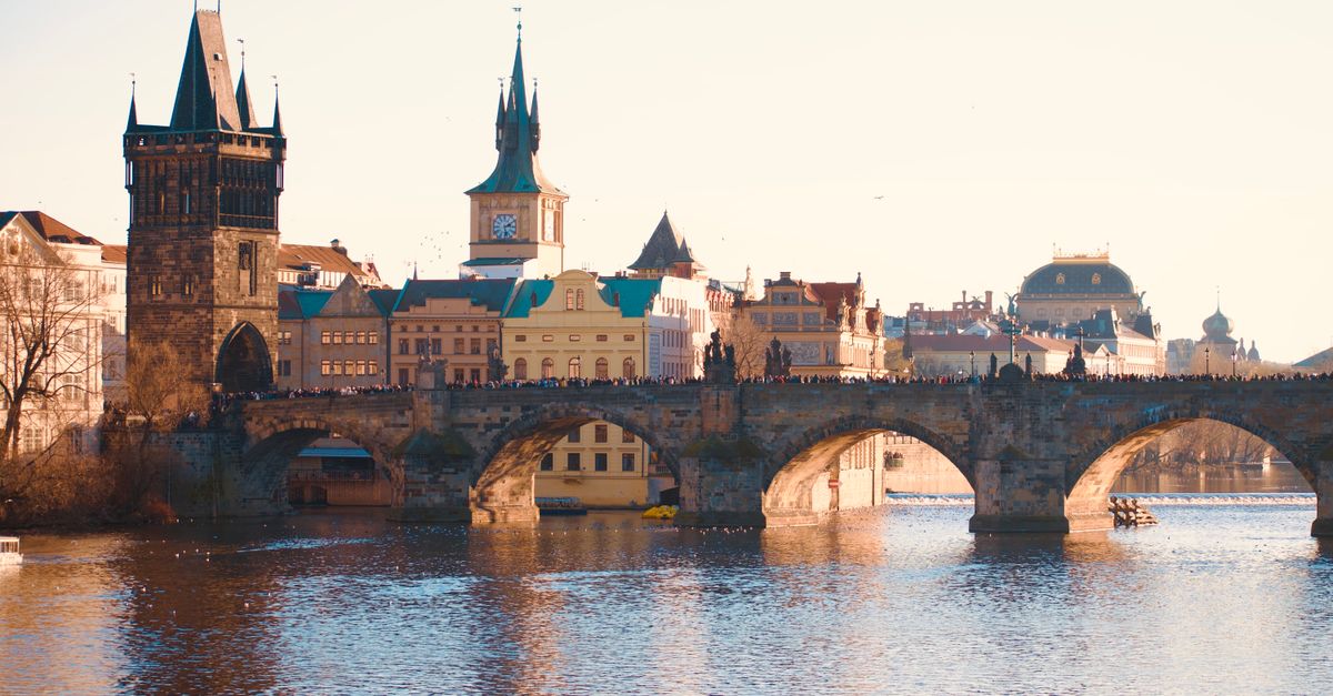 Scenic view of Charles Bridge and historic buildings in Prague, Czech Republic.